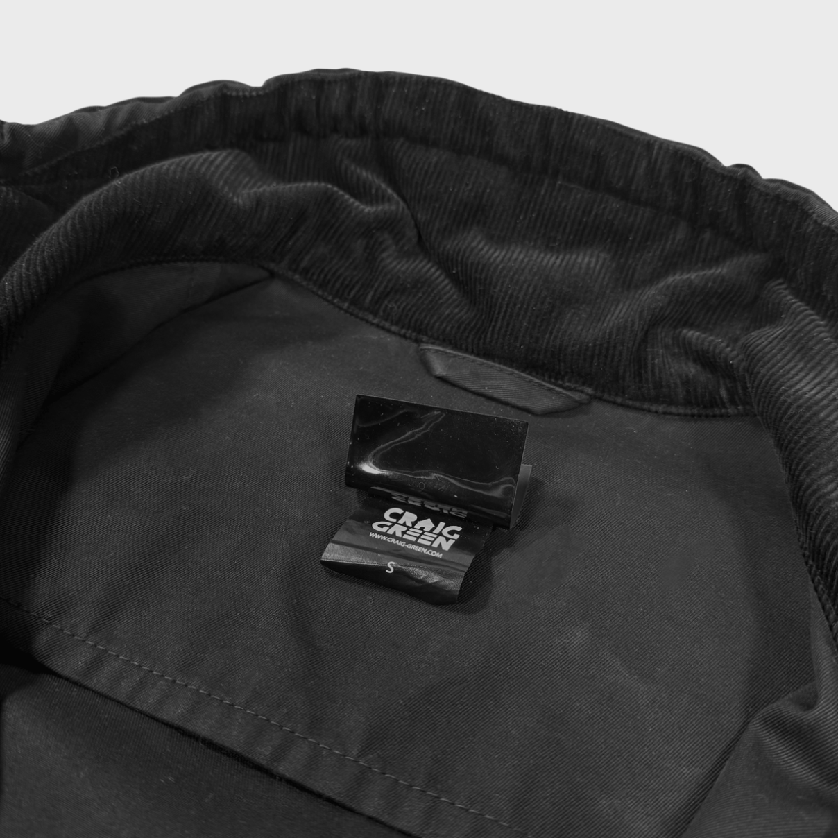 Craig Green Long waxed & belted coat