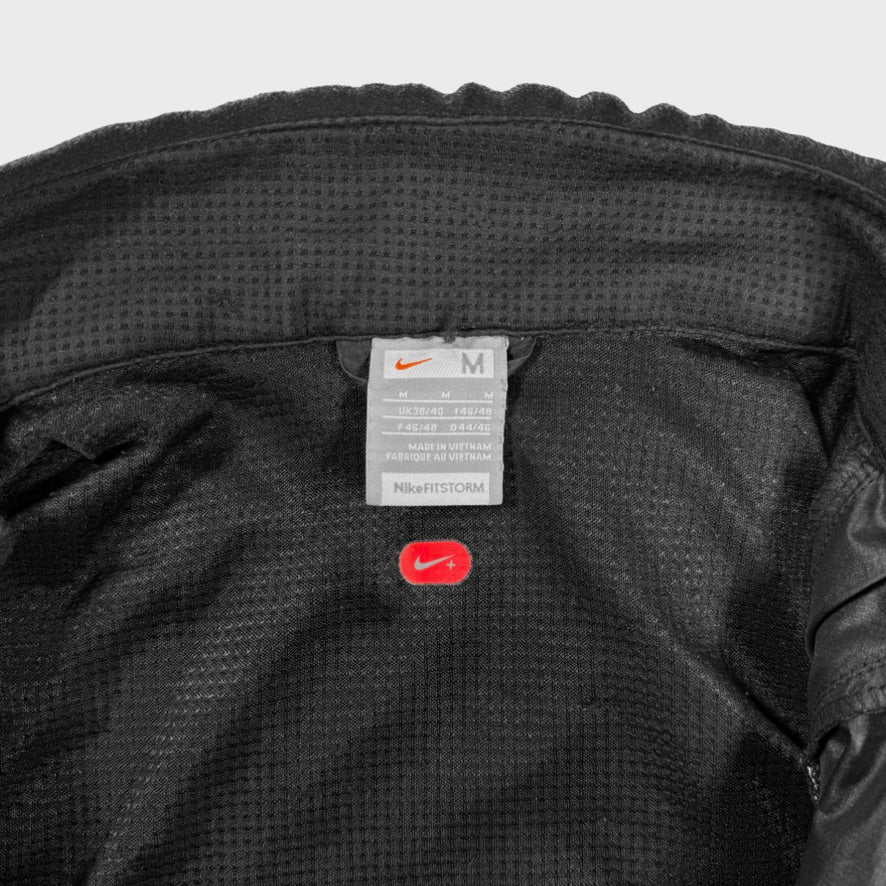2000's vintage Nike + FitStorm technical paneled jacket