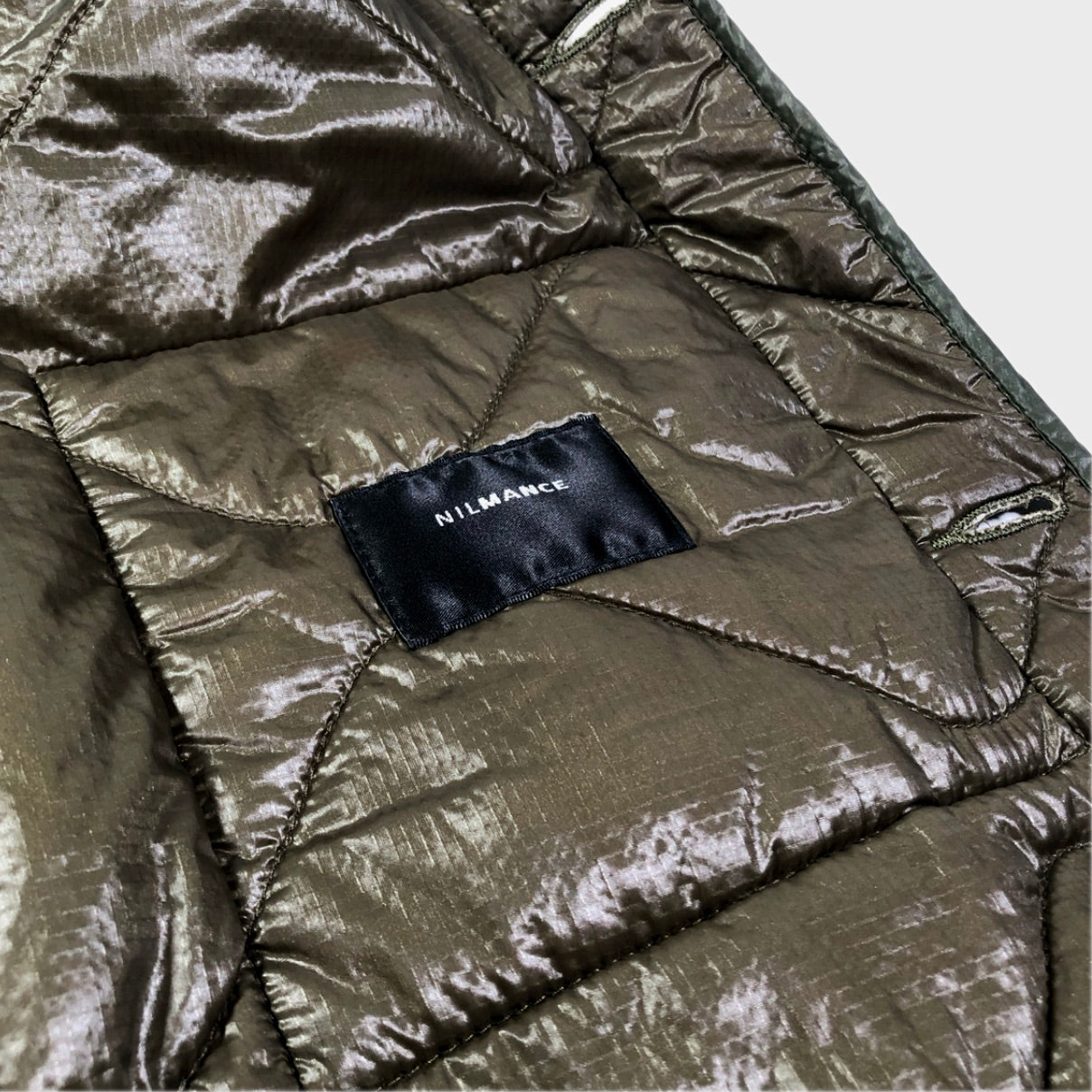 Recent Nilmance military inspired technical lining jacket